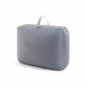 Harmaa kompressiokuutio, jossa on ilmareikä ja kantokahva